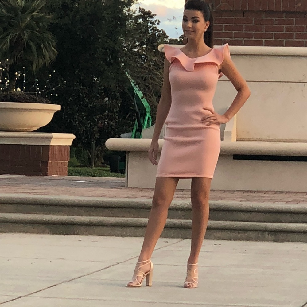 Beautiful scuba peach colored dress, form fitting, very flattering size small